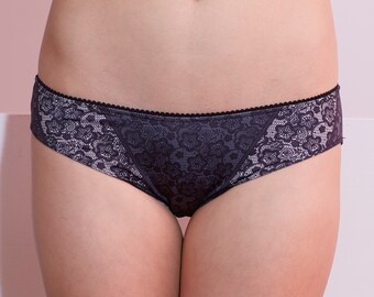 Pantalone in pizzo retrò. Stile bikini quotidiano, arte stampata in pizzo nero e nudo.