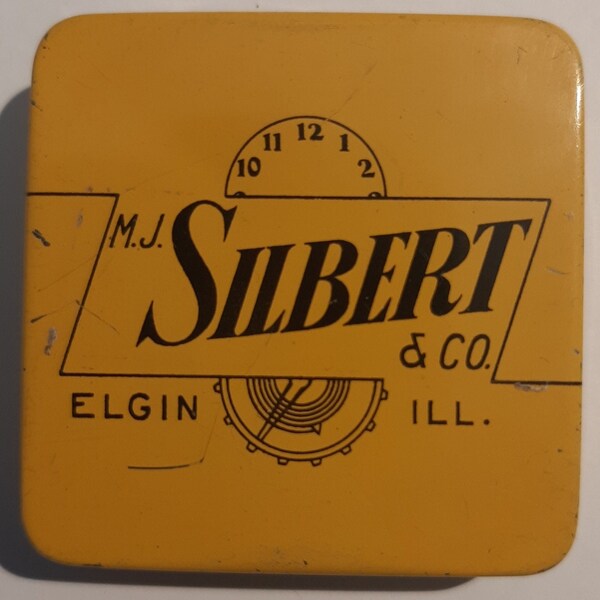 MJ Silbert Elgin Watch Company TIN held past watch parts