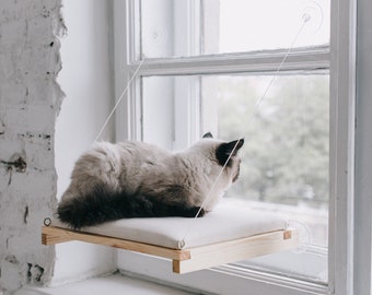 Cat window perch made from natural ecological recycled wood with cat pillow, cat window bed