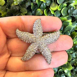 Vintage Jomaz Rhinestone Starfish Brooch: Silver Tone Pin