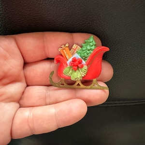 Vintage sieradenbroche Hallmark kerstsleecadeauspeld