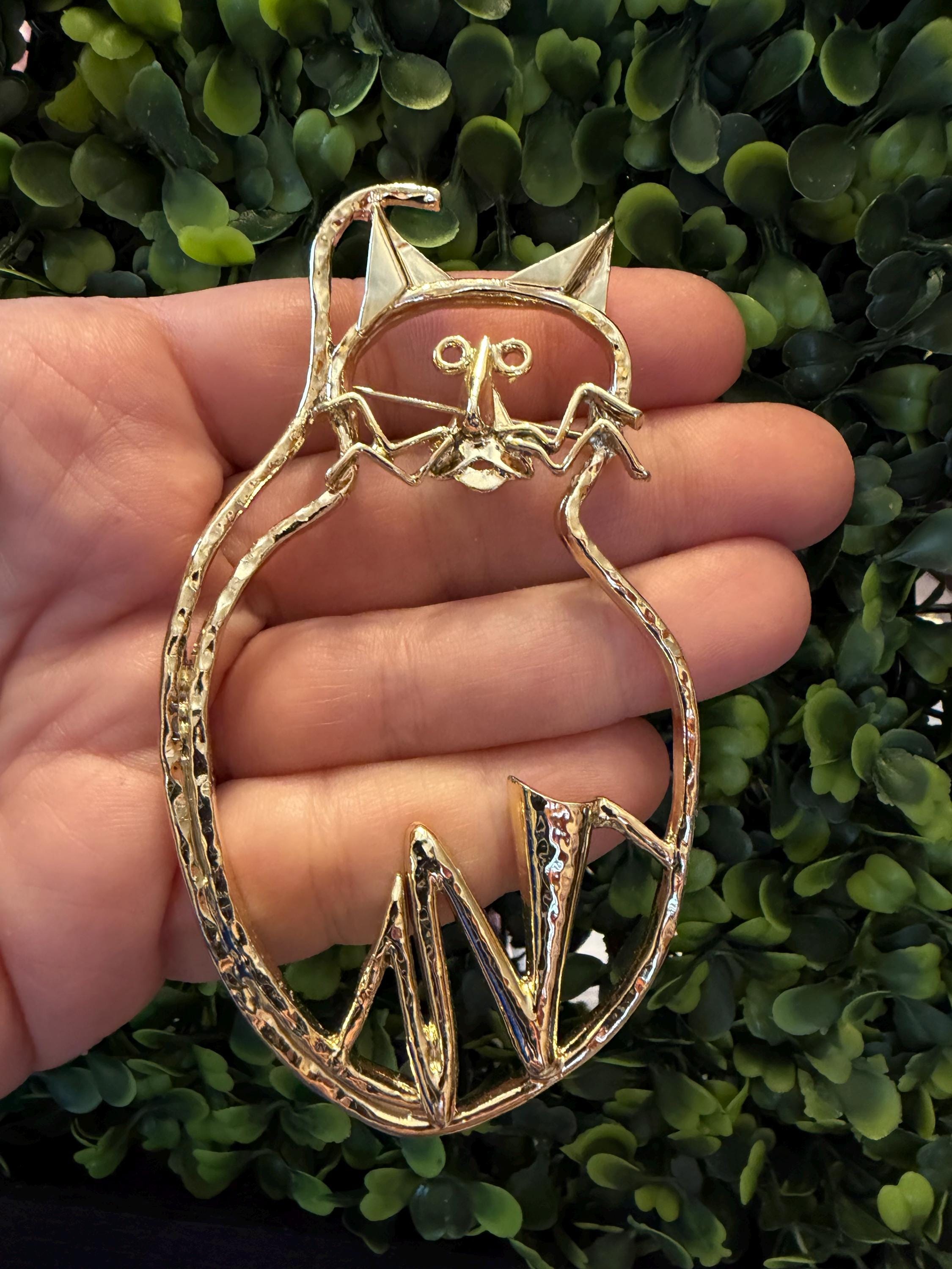 ヴィンテージの美しいゴールドトーンの猫のブローチ - Etsy 日本