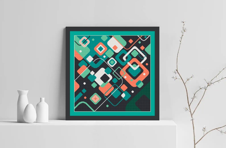 Pode incluir: Impress&atilde;o de arte geom&eacute;trica abstrata com fundo preto e quadrados e ret&acirc;ngulos coloridos em tons de verde, turquesa, branco e laranja. A impress&atilde;o &eacute; emoldurada em uma moldura preta com um passe-partout turquesa.