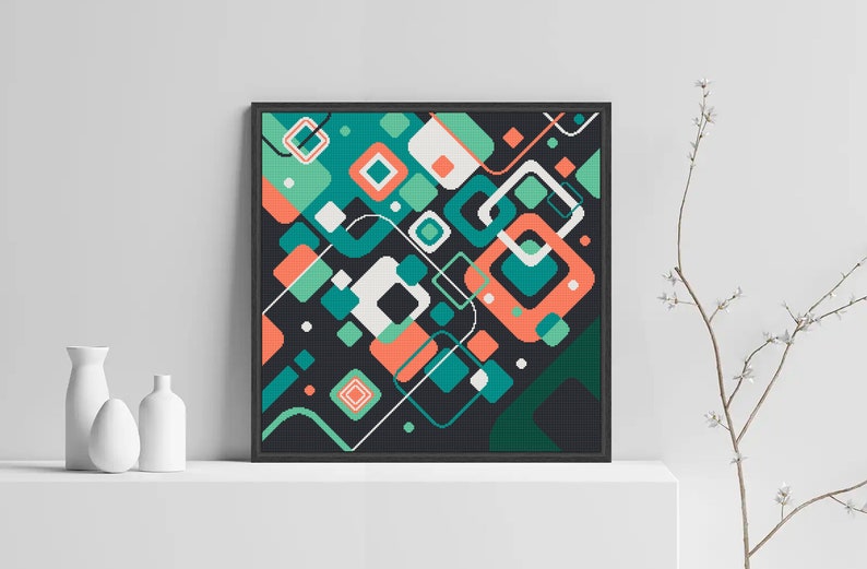 Pode incluir: Impress&atilde;o de arte geom&eacute;trica abstrata com fundo preto e formas coloridas em tons de turquesa, verde, branco e coral.
