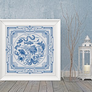 May include: A white framed picture with a blue and white design of various sea creatures inside a decorative frame. The design is reminiscent of a vintage tile.