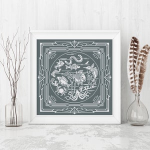 May include: A framed cross-stitch design featuring a gray background with a white outline of a circle filled with various fish, a crab, an octopus, and seaweed. The circle is surrounded by a geometric pattern.