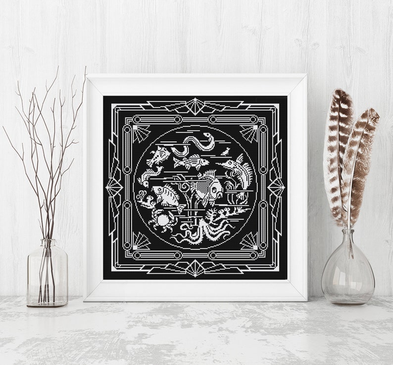May include: Black and white geometric design featuring a circle with various sea creatures, including fish, a crab, an octopus, and a snake. The design is framed by a square border with geometric patterns.