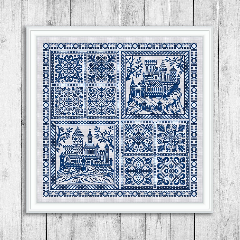 May include: A blue and white cross-stitch pattern featuring a castle and geometric designs. The pattern is framed in a white frame.