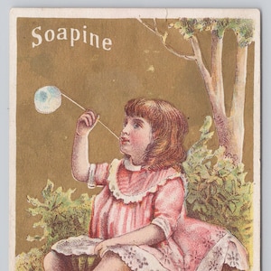 Carta commerciale vittoriana, produzione Soapine Kendall. Ragazza che soffia bolle