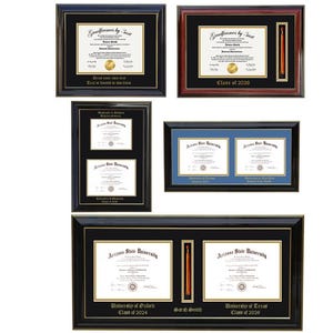 May include: A collection of framed diplomas and certificates in various sizes and styles. The frames are black, brown, and blue, with gold accents. Some frames hold single documents, while others display multiple. The certificates feature gold seals and text.