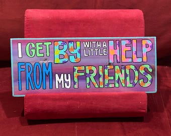 Lyrics to “A Little Help from My Friends” hand painted on wood