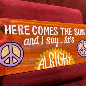 Lyrics to “Here Comes the Sun” hand painted on wood 60’s music inspired wall art