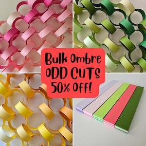 May include: A collage of colorful paper chains and strips. The chains are in shades of pink, green, and yellow. The text "Bulk Ombre ODD CUTS 50% OFF!" is displayed in a red box.