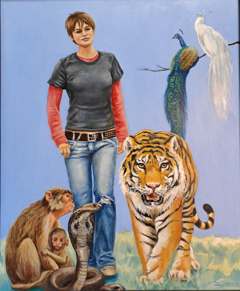 May include: An oil painting shows a woman in a black t-shirt and jeans, alongside a tiger, monkeys, and a cobra. A peacock and a white peacock are on a branch. The background is a light blue sky.