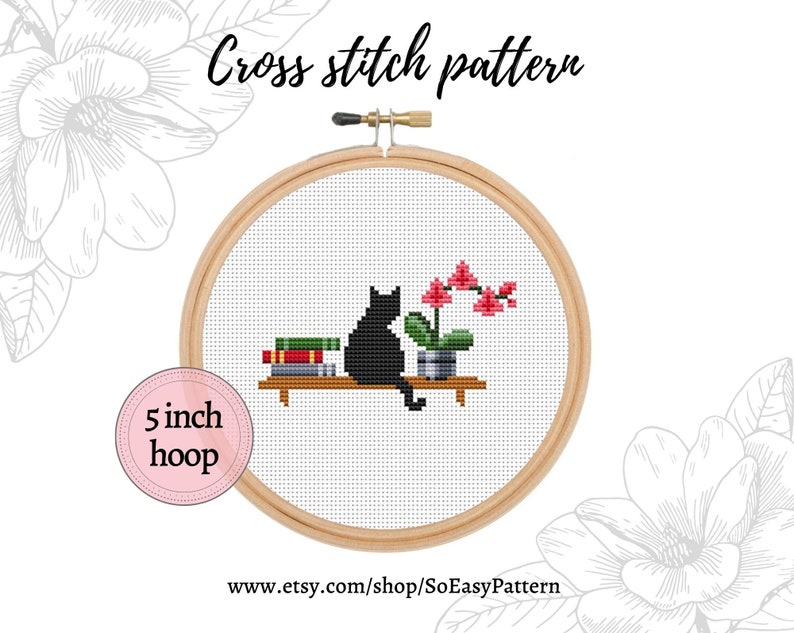 May include: Cross stitch pattern of a black cat sitting on a shelf with a stack of books and a potted orchid plant. The pattern is designed for a 5 inch hoop.