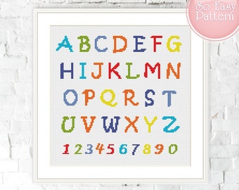May include: A colorful alphabet and numbers cross stitch pattern. The letters are in a variety of colors, including red, orange, yellow, green, blue, and purple. The numbers are in a similar color scheme.