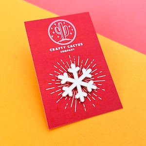Festive Glitter Snow Flake Hard enamel Pin, this years addition to our Christmas collection... let it snow!!
