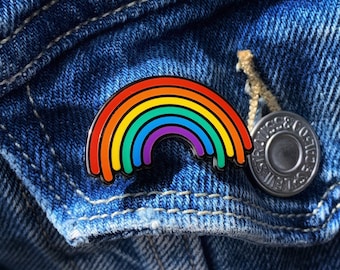 Pride Rainbow hard enamel pin, a great accessory for your denim jacket.