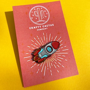 Retro Rocket Enamel Pin badge, enter space with our latest pin...