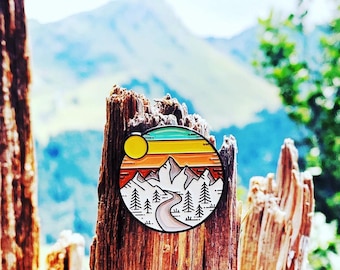 Pastel mountain sunset adventure enamel pin