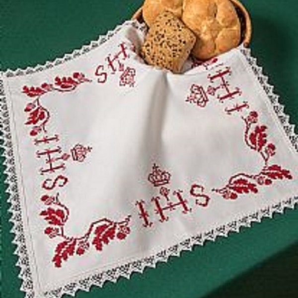 Auxiliary basket cover in traditional red and white hand embroidered with lace