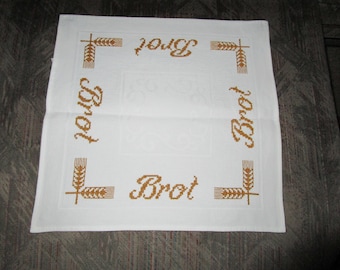 Hand-embroidered brown bread basket cover for year-round use, approx. 40 x 40 cm