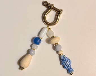 Blauwe tasbedel vis