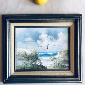 Vintage outsider artist oil painting of seagulls and sand dunes signed