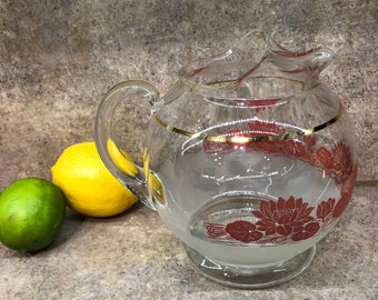 Mid century vintage glass pitcher with pink lotus