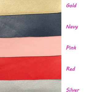 May include: A close-up of seven fabric swatches in different colors. The colors are black, gold, navy, pink, red, silver, and white. The text "Text Color" is written above the swatches.