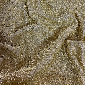 1 mtr gold sparkly glitter knit lurex stretch tinsel,christamas,dress,decoration fabric...58”wide