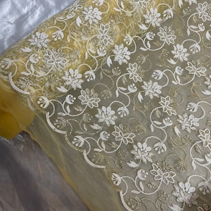 Yellow gold floral embroided scalloped tulle net bridal fabric..54” wide