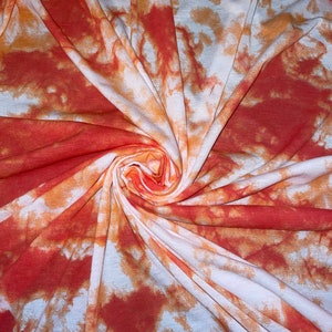 1 mtr white/orange tie dye viscose jersey stretch fabric..58” wide 147cm
