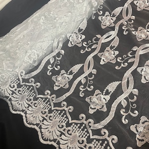 White embroided  pearl scalloped tulle net bridal fabric..52” wide