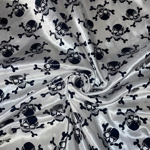 White/black skull,bones printed satin fabric..58&quot; wide (147cm)