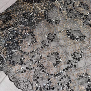 Grey/gold sequin floral embroided scalloped tulle net bridal fabric..52” wide