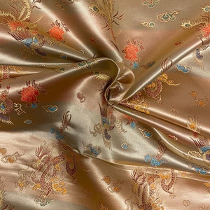 1 mtr gold oriental chinese dragon brocade fabric..36” wide