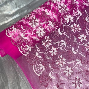 Hot pink floral embroided scalloped tulle net bridal fabric..54” wide