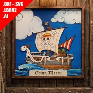 May include: Wooden artwork of a ship with a skull and crossbones on the sail, set against a blue background with clouds. The ship is named "Going Merry" and is framed in a dark wood. The top left corner has the text ".DXF .SVG .LBRN2 .AI".