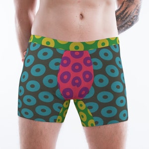 May include: Black boxer shorts with a colorful geometric pattern of circles. The pattern is made up of blue, green, yellow, pink, and purple circles.