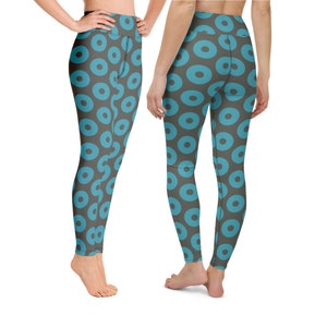 May include: Gray yoga leggings with a blue donut pattern.