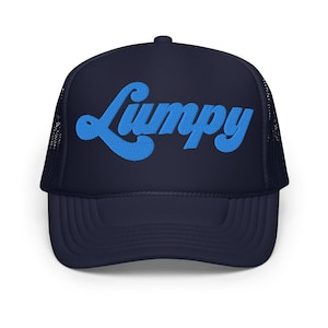 May include: A navy blue trucker hat with a blue embroidered logo that says "Lumpy" in a retro font.