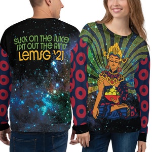 May include: A black sweatshirt with a galaxy print and the text "suck on the juice spit out the rind Lemsg '21" on the back. The front of the sweatshirt features a colorful illustration of a person sitting in a lotus position with a bowl of fruit.
