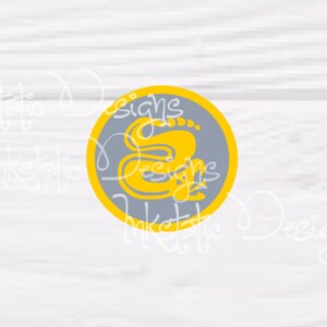 May include: A circular graphic with a gray background and a yellow border. The graphic features the word "Designs" in yellow script, along with the letter "S". The background is a light gray wood grain.