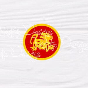 May include: A circular graphic featuring a yellow monkey-like figure inside a red circle with a yellow border. The text "Inkstatic Designs" is visible in a cursive font around the graphic. The design is set against a white wood grain background.