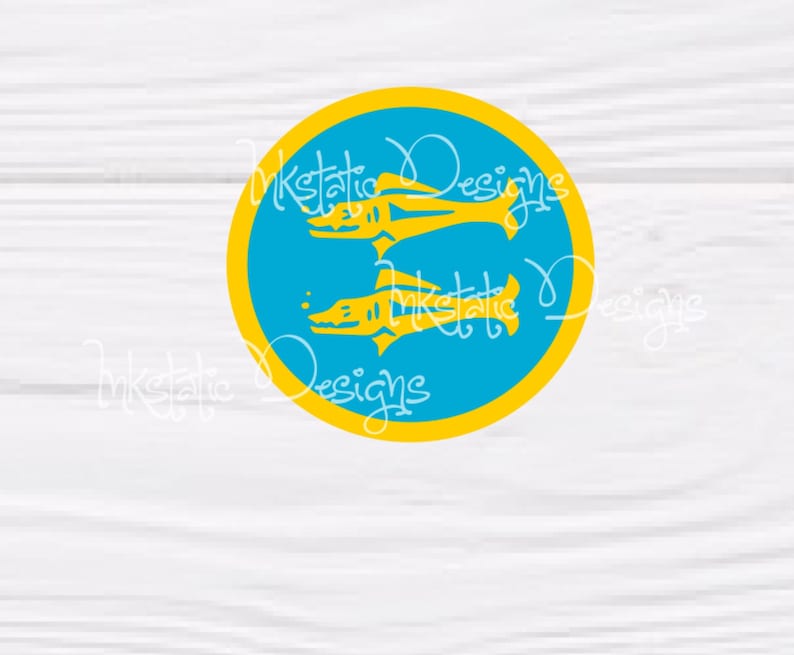 May include: A round sticker featuring two yellow fish swimming in opposite directions within a blue circle, framed by a yellow border. The sticker has the text "Inkstatic Designs" in white script. The background is a white wood grain.