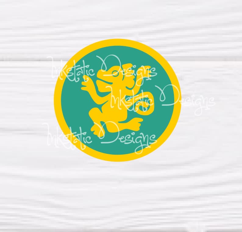 May include: A round sticker with a yellow outline and a teal center. A yellow silhouette of a creature is in the center. The text "Inkstatic Designs" is written around the edge of the sticker in a cursive font.
