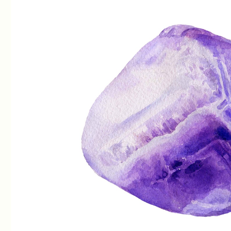 May include: A close-up of a purple amethyst crystal with a white background. The crystal has a natural, rough texture and a deep purple color.