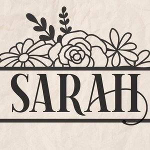May include: Black and white floral design with the name "SARAH" in a bold font, centered between two horizontal lines.