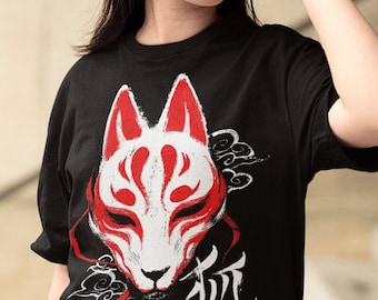 May include: Black t-shirt with a white and red fox mask graphic and the Japanese character "狐" (fox) printed on the front.